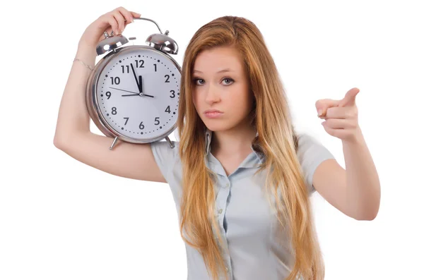 Young woman with clock on white — Stock Photo, Image