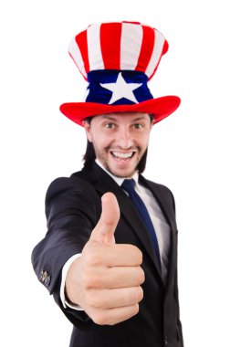 Amerikan bayrağı taşıyan adam beyazların üzerinde izole edilmiş.