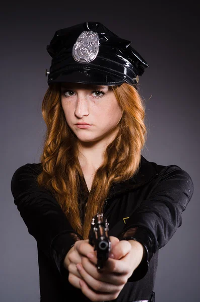 Woman police office with gun — Stock Photo, Image