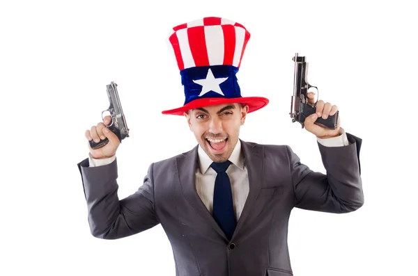 Hombre con pistola y sombrero americano — Foto de Stock