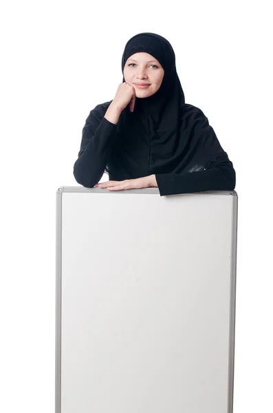 Muslim woman with blank board on white — Stock Photo, Image