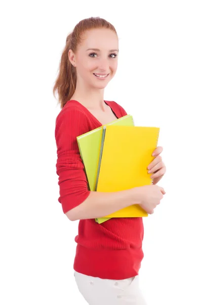 Junge Studentin mit Büchern auf weiß — Stockfoto