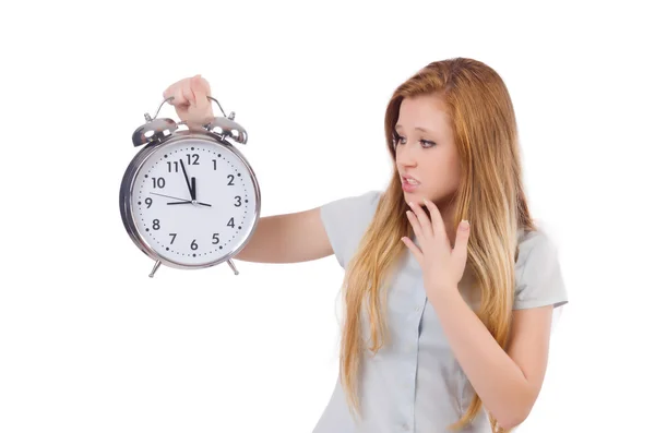 Young woman with clock on white — Stock Photo, Image