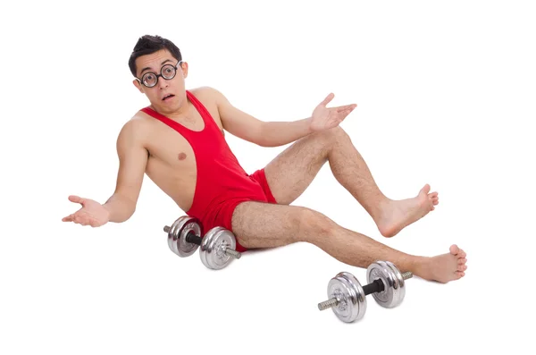 Chico divertido haciendo ejercicio con mancuernas en blanco — Foto de Stock