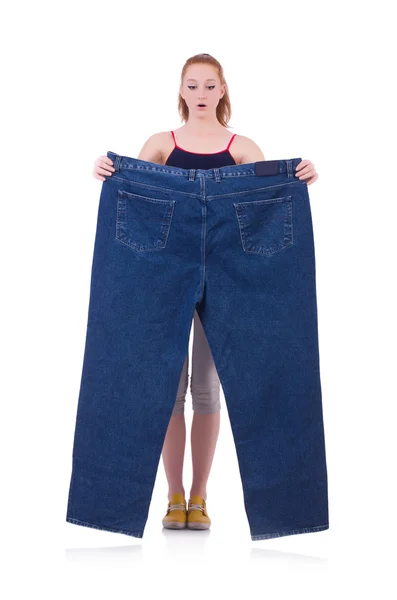 Donna con grandi jeans nel concetto di dieta — Foto Stock