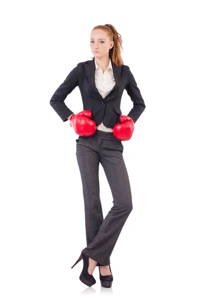 Femme d'affaires avec gants de boxe sur blanc — Photo