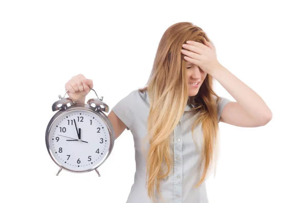 Young woman with clock on white — Stock Photo, Image