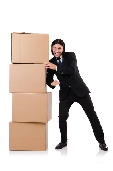 Vtipný muž s krabicemi na bílém — Stock fotografie