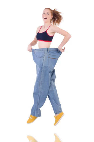 Donna con grandi jeans nel concetto di dieta — Foto Stock