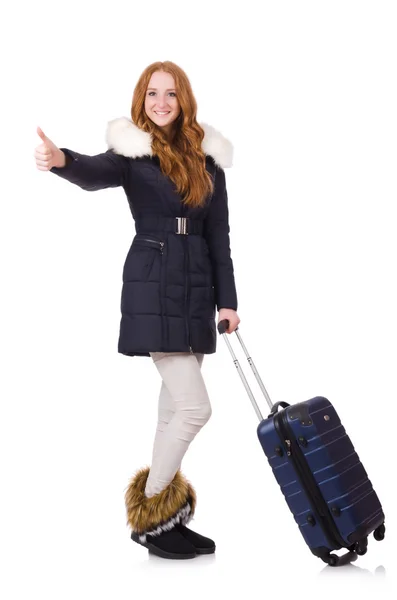 Kobieta z walizką przygotowuje się do zimowych wakacji — Zdjęcie stockowe