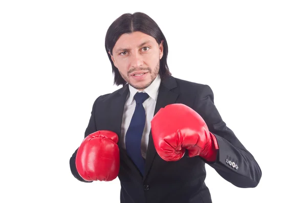 Homme d'affaires avec gants de boxe sur blanc — Photo