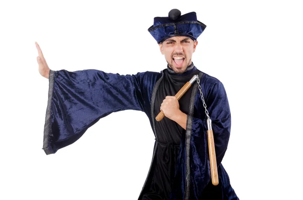 Maestro di arti marziali con nunchaku su bianco — Foto Stock