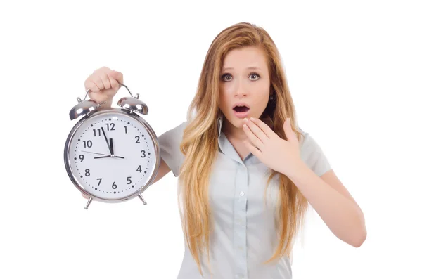 Young woman with clock on white — Stock Photo, Image