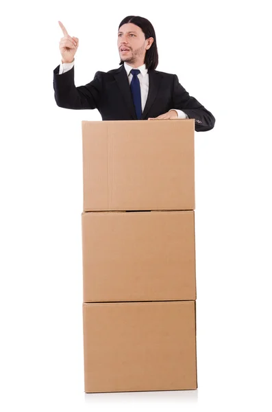 Hombre divertido con cajas en blanco — Foto de Stock