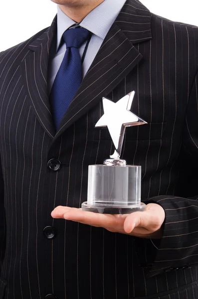 Businessman with star award isolated on white — Stock Photo, Image