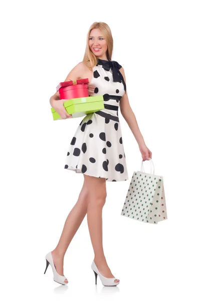 Giovane donna con lo shopping di Natale su bianco — Foto Stock