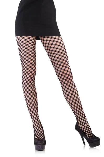 Woman legs in fishnet stockings — Stock Photo, Image
