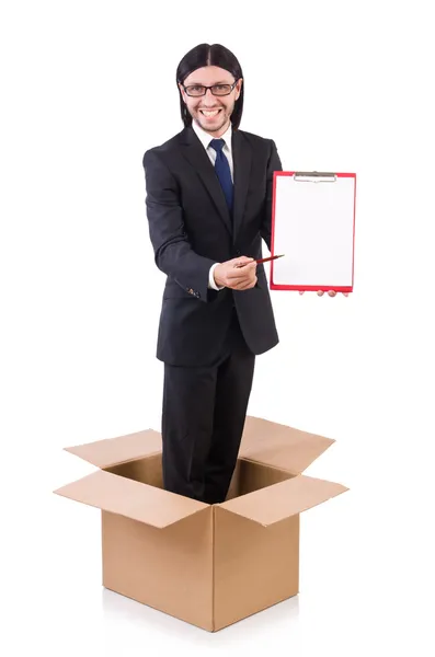 Бизнесмен в мышлении из коробки — стоковое фото