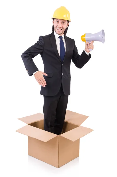 Man with hardhat and loudspeaker standing in the box — Stock Photo, Image