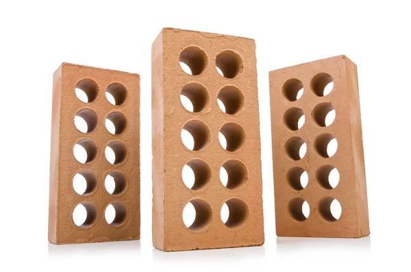 Pilha de três tijolos de argila — Fotografia de Stock