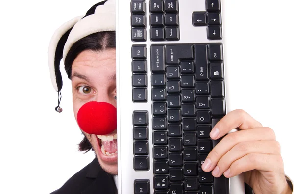 Смешной клоун с клавиатурой — стоковое фото