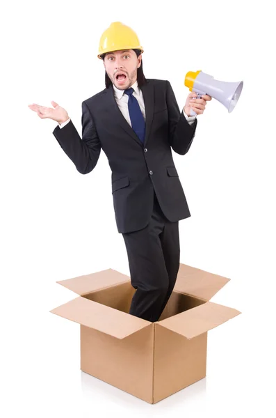 Uomo con cappello rigido e altoparlante in piedi nella scatola — Foto Stock
