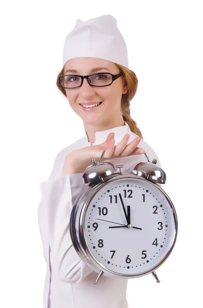 Woman doctor with big clock Stock Image