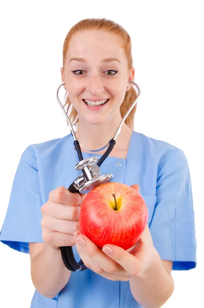 Bonito doctor en uniforme azul — Foto de Stock