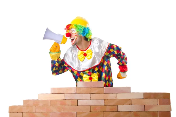 Clown laying bricks — Stock Photo, Image