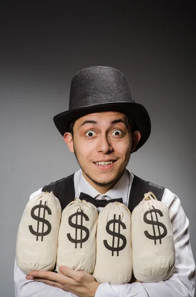 Muž s pytli peněz — Stock fotografie