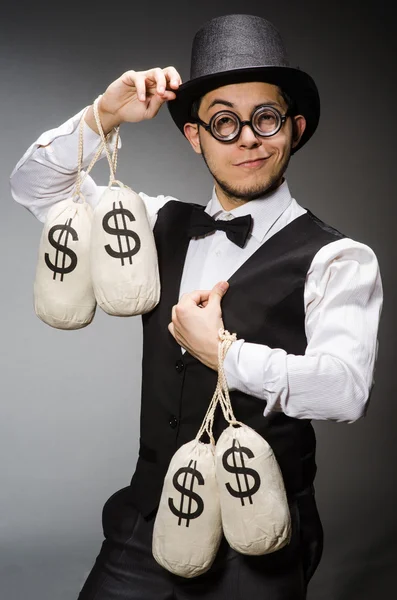 Homme avec des sacs d'argent — Photo