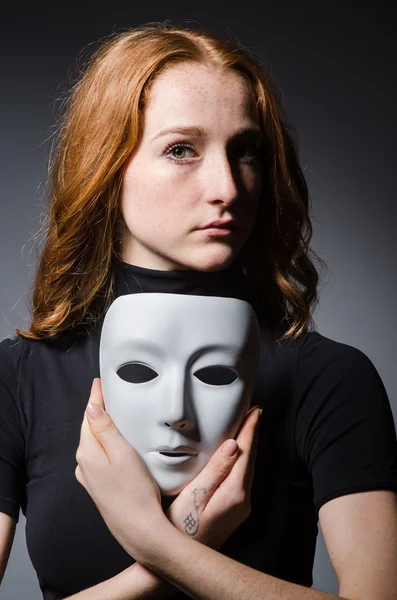 Woman with masks in hypocrisy consept — Stock Photo, Image