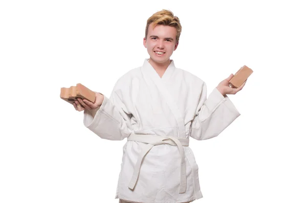 Karate man breaking bricks — Stock Photo, Image