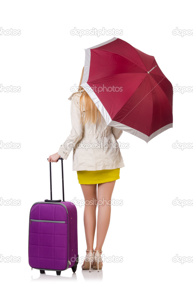 Woman with suitcase and umbrella