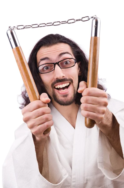 Homem de karaté com nunchucks — Fotografia de Stock