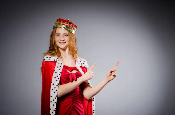 Królowa w czerwonej sukience — Zdjęcie stockowe