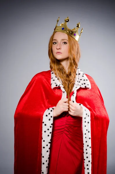 Królowa w czerwonej sukience — Zdjęcie stockowe