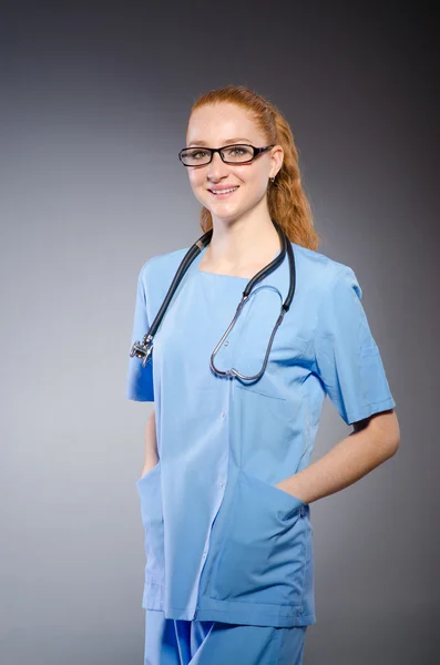 Woman doctor with the stethoscope — Stock Photo, Image