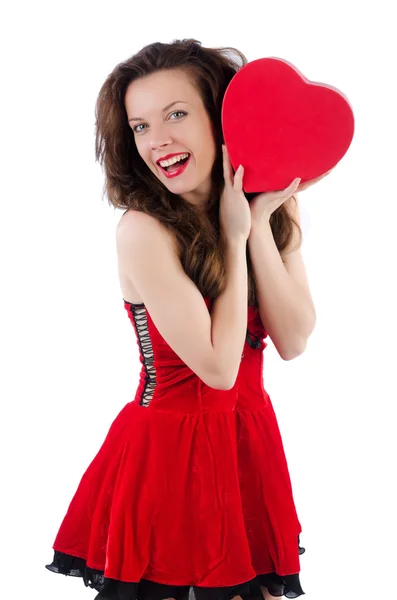 Jenta i rød kjole med hjerte. – stockfoto