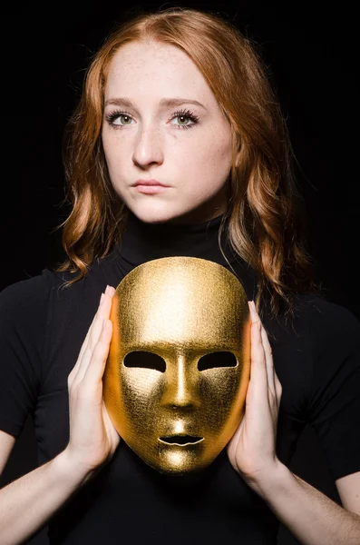 Redhead woman in hat with mask — Stock Photo, Image