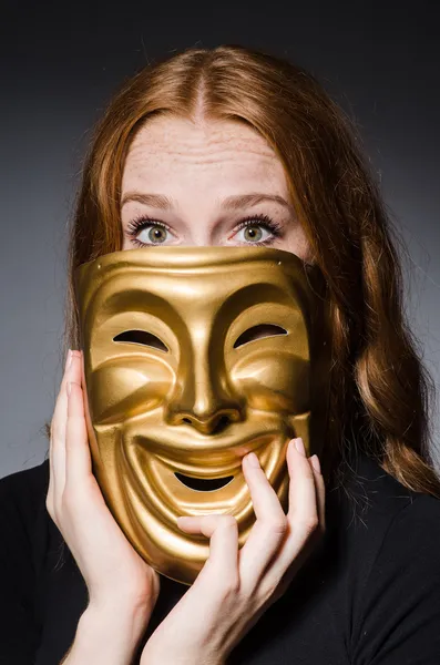 Redhead woman with masks — Stock Photo, Image