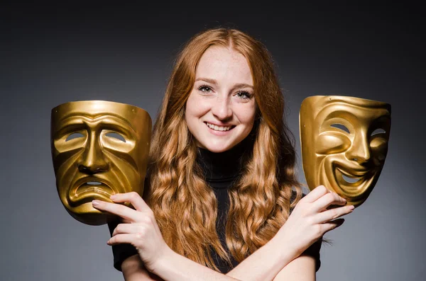 Redhead woman with masks — Stock Photo, Image