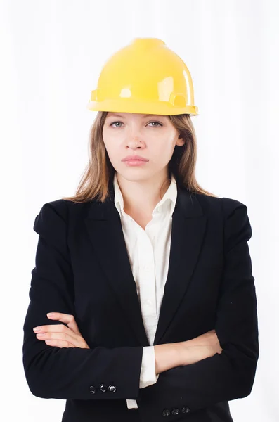 Pretty businesswoman with hard hat Royalty Free Stock Images
