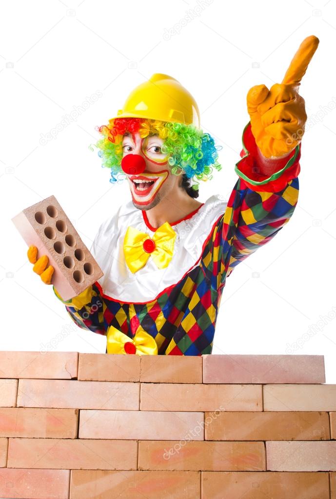Clown laying bricks