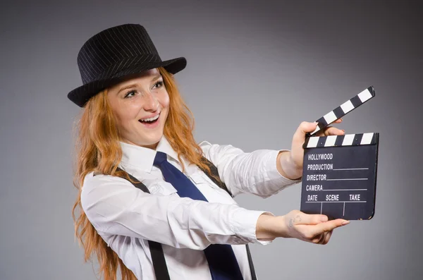 Young woman with movie board — Stock Photo, Image