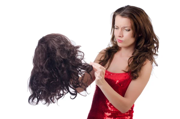 Mujer con una selección de peluca — Foto de Stock