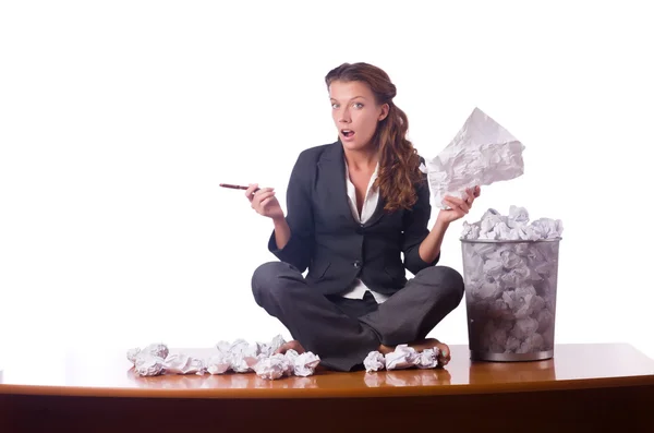 Woman with lots of discarded paper — Stock Photo, Image