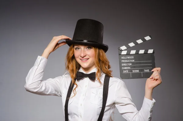 Young woman with movie board — Stock Photo, Image