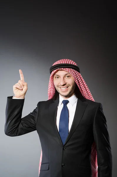 Arab businessman pressing virtual buttons — Stock Photo, Image