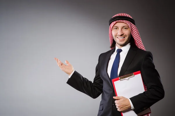 Arab man with paper binder — Stock Photo, Image